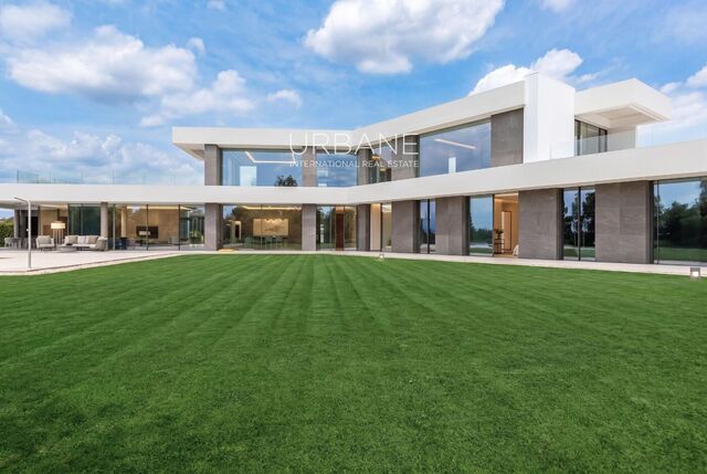 Luxury Frontline Golf Villa for Sale - 5 suites, private pool & spa, and a 4-car garage