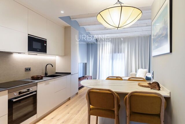 Ático de un dormitorio a estrenar con terraza privada en la azotea en Gràcia