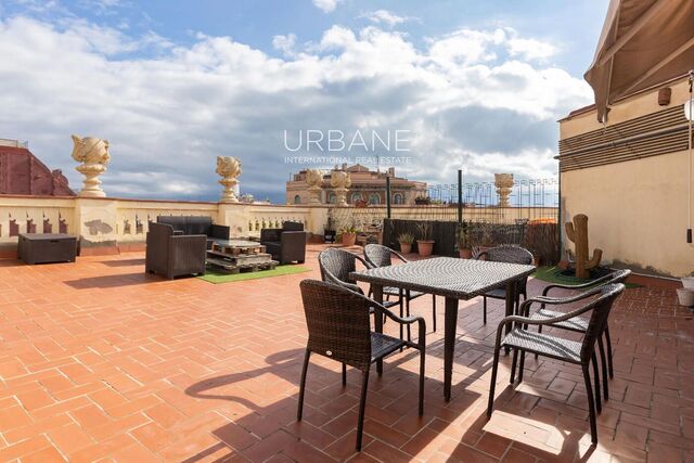 Ático Exclusivo con Terraza Privada en Finca Regia Histórica