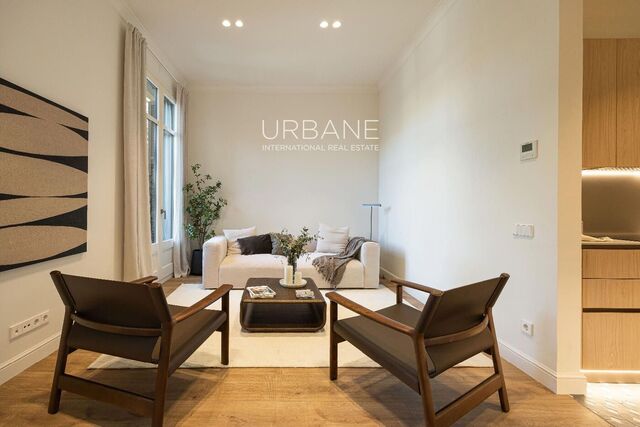 Elegante propiedad totalmente reformada en una Finca Regia histórica en L'Eixample