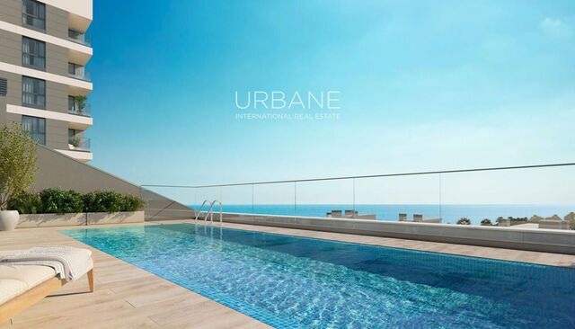 Apartamento con vista al mar, 3 habitaciones, terraza y rooftop con piscina en Badalona
