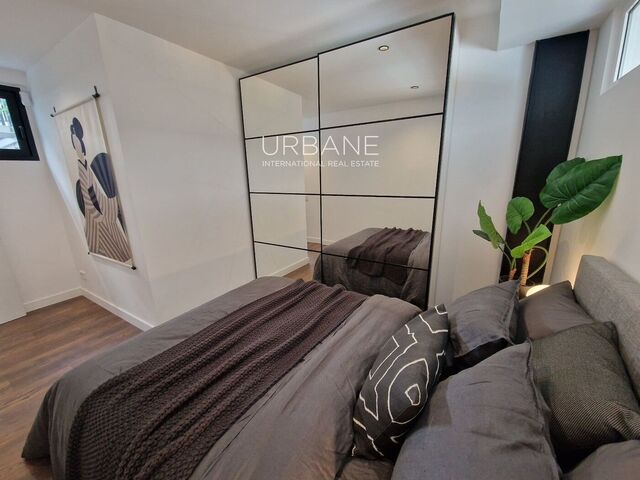 Elegancia Moderna y Tranquilidad: Gema en Planta Baja con Jardín Privado en Poblenou